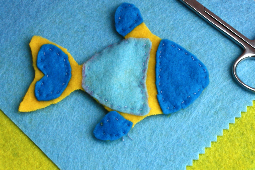 Sewn fish with felt and scissors