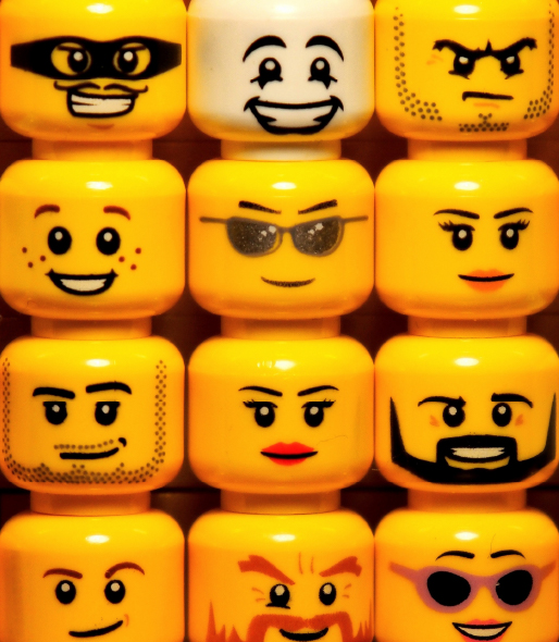 Multiple Lego® mini-fig heads with different expressions