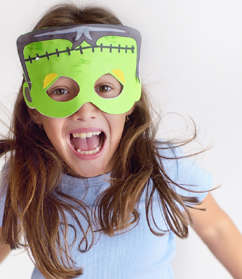 Young girl with Frankenstein's monster mask