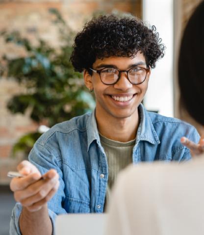 Young man sitting at an interview