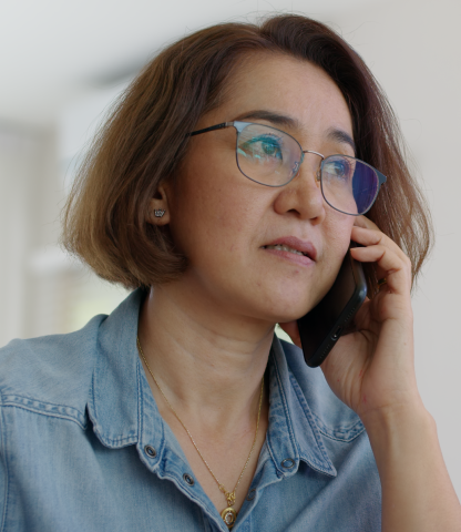 Woman holding cellphone to her ear