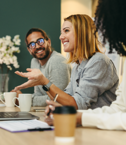 Group of people talking while having coffee