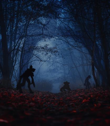 Creepy wooded grove with demogorgon silhouettes 