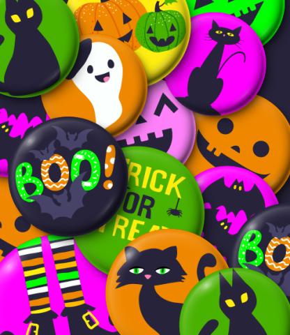 A pile of Halloween-themed buttons