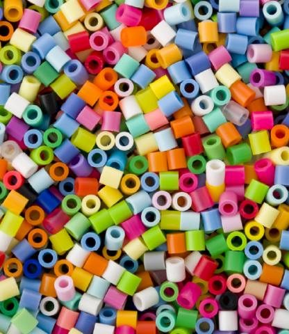 Pile of brightly colored perler beads