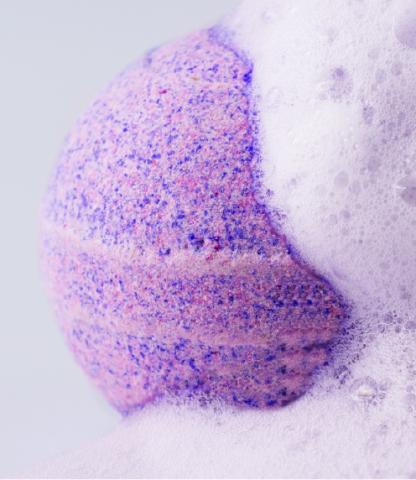 Purple bath bomb with bubbles