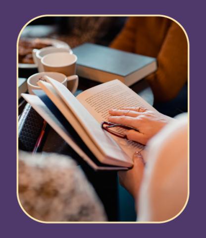 Woman reading book inside