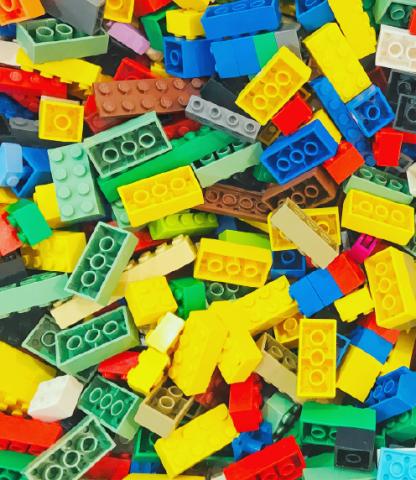 Scattered, multi-colored Lego bricks