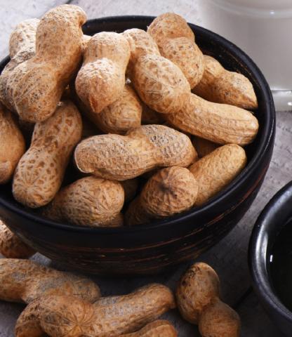 Peanuts in a black bowl