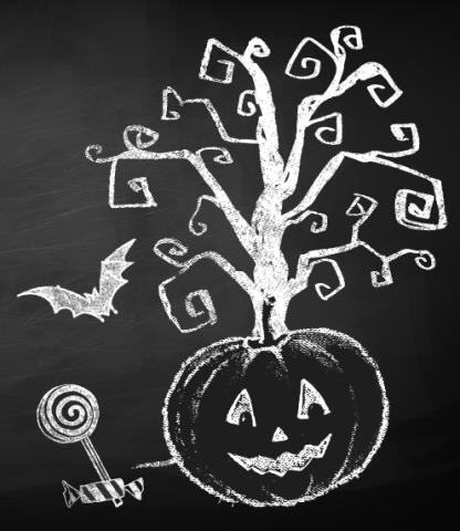Chalk drawing of a jack-o-lantern, spooky tree, bat, lollipop, and wrapped candy