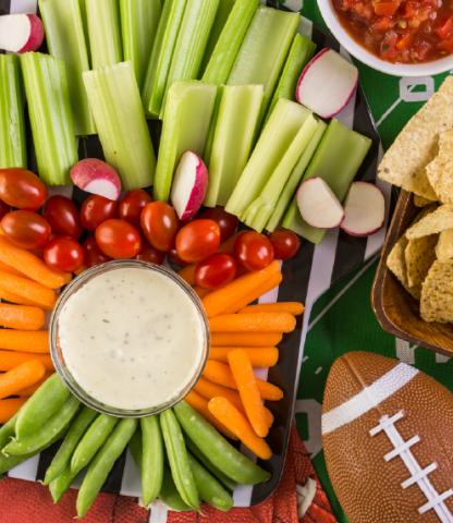 Crudités platter with football and salsa