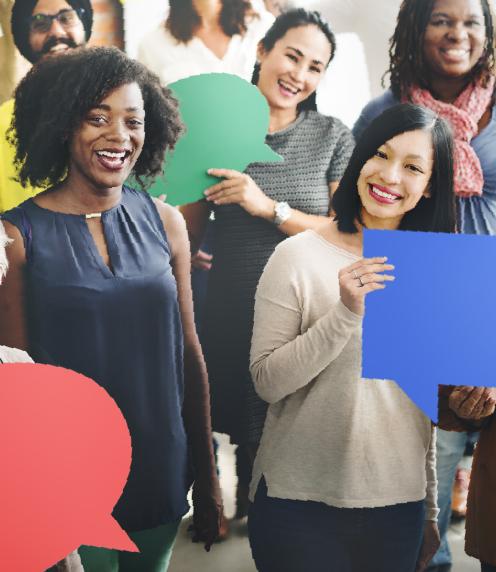 Group of diverse people holding up speech bubbles