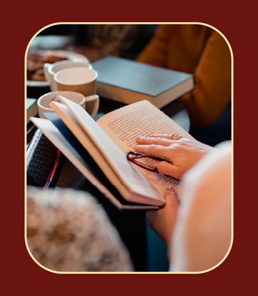 Woman reading book inside