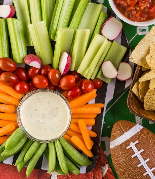 Crudités platter with football and salsa